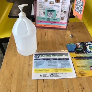 Menus available via clipboard and QR code w/ hand sanitizer