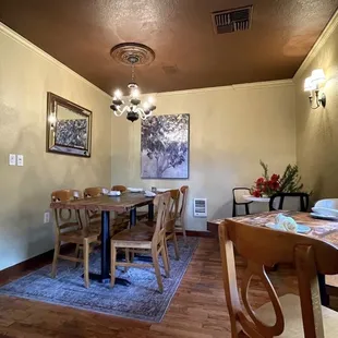 a dining room table and chairs