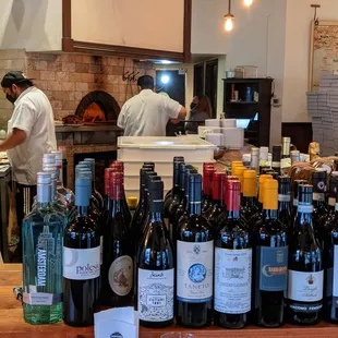 several bottles of wine on a counter