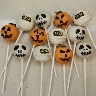 a pile of halloween cake pops
