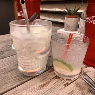 two glasses of water and a fork