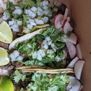 Carne asada tacos (also recommend the plantain tacos)