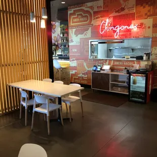 a table and chairs in a restaurant