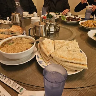a table full of food and drinks