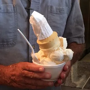Peach ice cream in a bowl