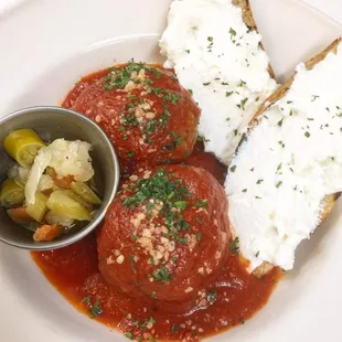 Meatball appetizer grilled crostini, ricotta cheese, giardinera