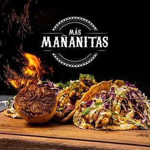 a plate of food on a cutting board