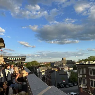 a crowd of people on a roof
