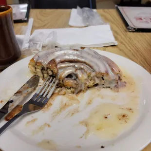Amazing Texas sized cinnamon roll! We got it to split with the entire table.