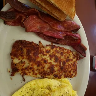 Bacon, eggs and toast . Bacon was HUGE!