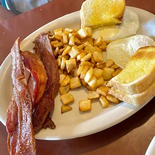 Full egg/bacon/potatoes/toast plate $11.99, all great especially the bacon!