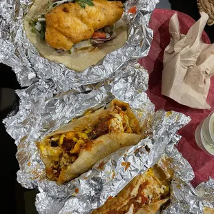 (From top to bottom) Topo Chico-Battered Fish, Brisket, Egg and Cheese, Chorizo,egg and cheese