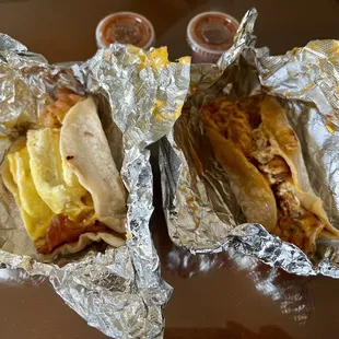 Bacon,egg,and cheese taco (left) Chorizo,egg and cheese taco (right)