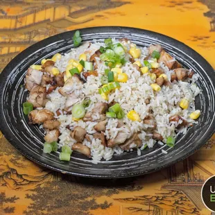 a plate of rice and vegetables