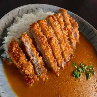 Tonkatsu Curry Rice - Deep fried breaded pork with Japanese curry and rice.