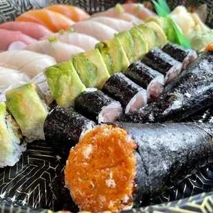 Sushi for Two: spicy tuna hand rolls, tuna roll, dragon roll, and assorted nigiri