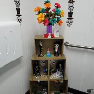 Fun in the women&apos;s bathroom ... I think it&apos;s some sort of Day of the Dead ofresa?