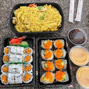 Singapore chicken Noodles. 2 orders of spicy salmon rolls and a village roll. Sauce on side.