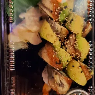 a close up of a plate of sushi