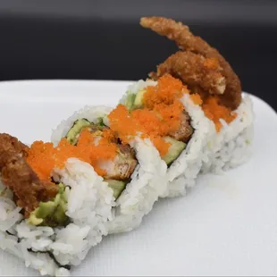 a piece of sushi on a plate