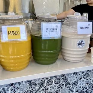 a woman standing behind a counter
