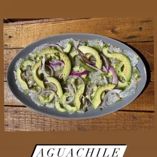 a plate of avocado and onions