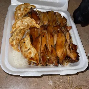 a meal in a styrofoam container