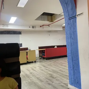 Flooded peeling stained ceiling The lights were flickering