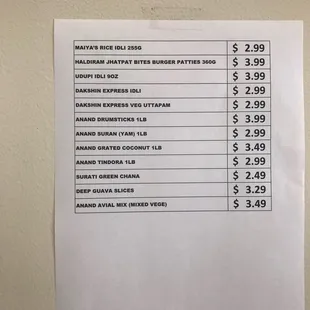 a price list on a wall