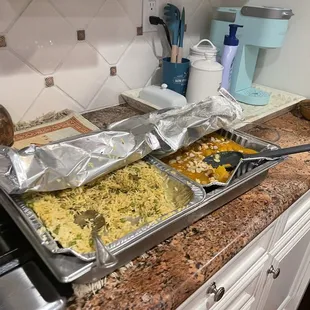 two pans of masala curry