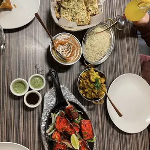 Garlic Naan Butter Chicken Aloo Gobi Tandoori Salmon Mango Lemonade