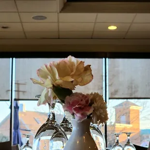 a vase of flowers on a table