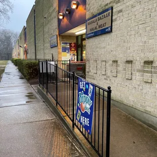 a sign in front of a restaurant