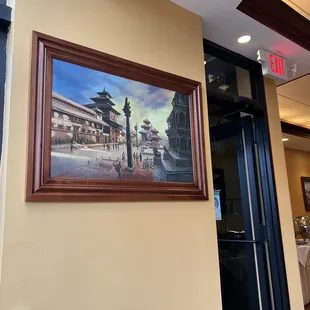 a painting of a street scene in a restaurant