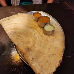 Onion dosa... that thing is huge!