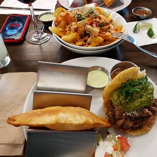 Chicken empanada, Buffalo fries, mojito, wine, and etc.