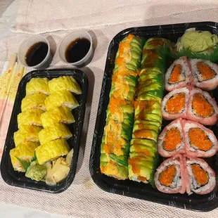 two trays of sushi