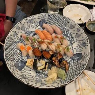 a plate of sushi on a table