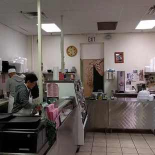 two people in a kitchen