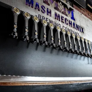 a row of beer taps