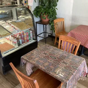 a table and chairs in a restaurant