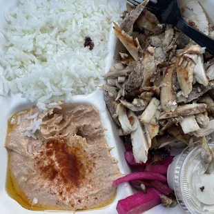a meal in a styrofoam container