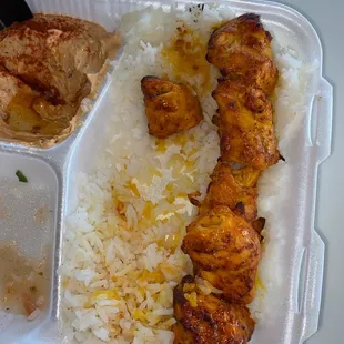 Chicken skewers with spicy hummus