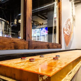 a shuffle table in a bar