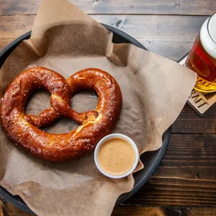 a pretzel and a mug of beer