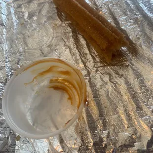 Churro with a side of cajeta