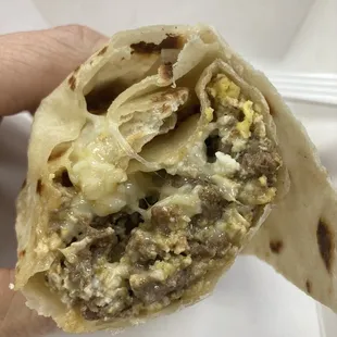 Protein bomb! Breakfast burrito with carne asada, eggs, and cheese in the BEST tortilla!