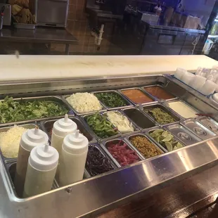 Selection of greens/toppings & Salsas