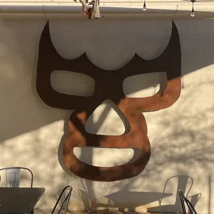 a mask on a wall