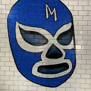 a blue and white mask